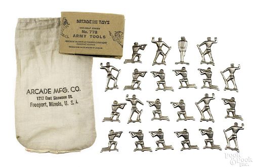 Arcade cast iron Marine figures with original box and bag, nickel-plated