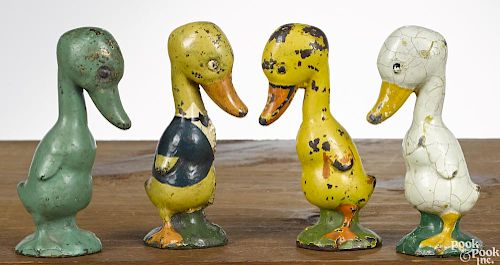 Four Albany Foundry Company cast iron duck paperweights, 4 7/8'' h.