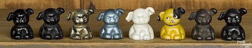 Eight Hubley cast iron pup paperweights, to include Hines, Blue, St. Louis, etc., 1 5/8'' h.