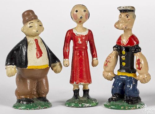 Three Hubley cast iron paperweights, to include Popeye, Olive Oyl, and Wimpie, 3 1/4'' h.