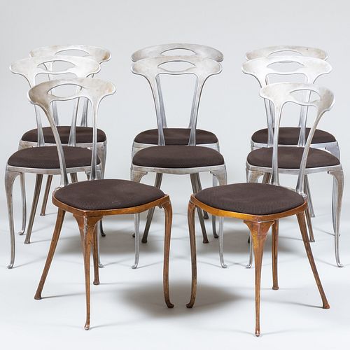 Set of Eight Art Nouveau Style Cast Aluminum Chairs and a Directoire Style Polished Steel Dining Table