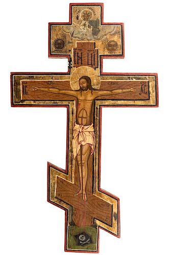 A RUSSIAN SHAPED ICON OF THE CRUCIFIXION, 19TH CENTURY