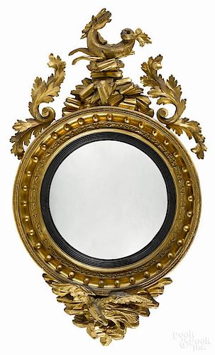 Pair of classical giltwood convex mirrors, ca. 1