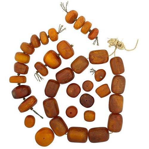 GROUP OF LARGE ANTIQUE BUTTERSCOTCH AMBER BEADS