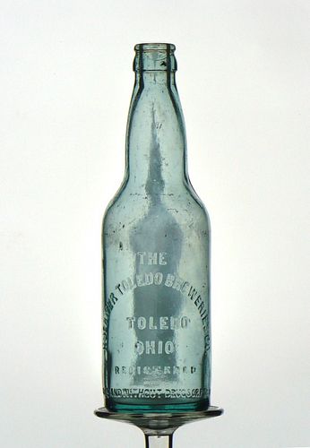 1911 Huebner Brewing Company Beer Embossed Bottle Toledo Ohio