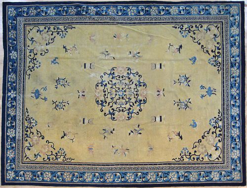 Roomsize Peking rug, late 19th c., with a floral m