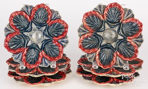 Set of six majolica oyster plates