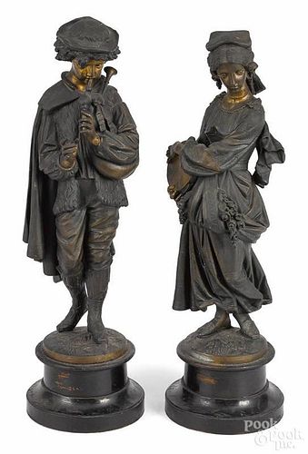 Pair of spelter statues, 19th c., with a bronze finish, 24 1/2'' h., and 23 1/2'' h.