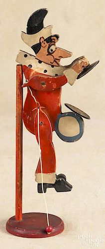 Carved and painted mechanical clown with cymbals, early 20th c., 12 1/2'' h.