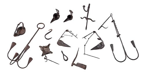 Eight Wrought Iron Lighting Implements
