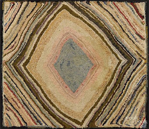 Hooked rug in a variegated diamond pattern, early 20th c., 36'' x 31''.