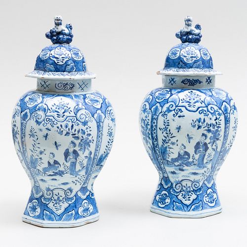 Pair of Delft Blue and White Vases and Covers
