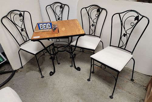 wrought patio table w/4 chairs