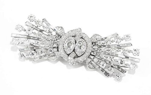 A diamond and platinum double clip brooch