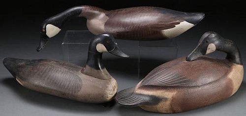 THREE CARVED AND PAINTED WOOD GEESE DECOYS