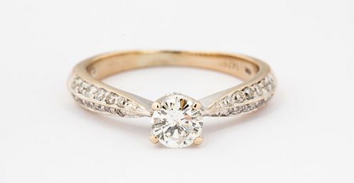 A 18K Gold and Diamond Engagement Ring