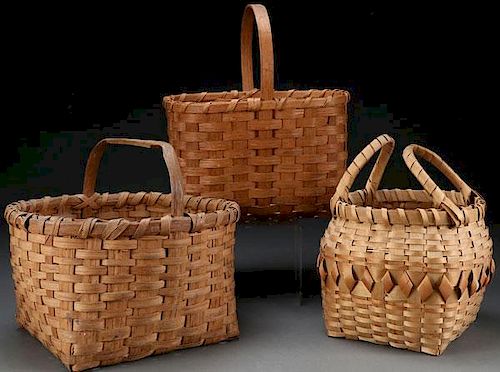 A GROUP OF THREE WOVEN BASKETS, 20TH CENTURY