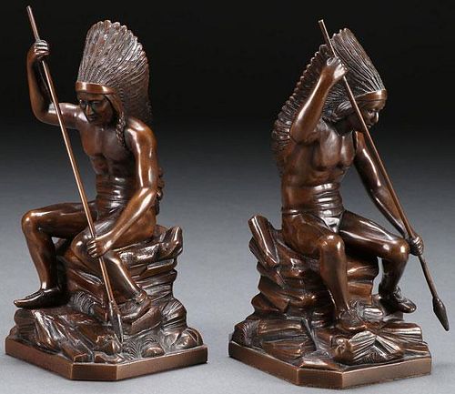 A PAIR OF FIGURAL BRONZED BOOK ENDS
