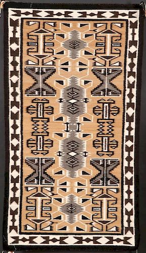 A GROUP OF FIVE SOUTHWEST NAVAJO HANDWOVEN RUG