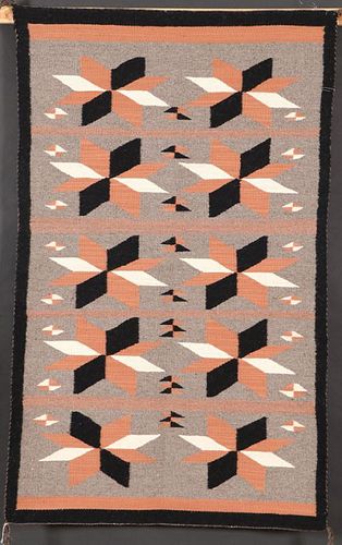 A GROUP OF FOUR SOUTHWEST NAVAJO HANDWOVEN RUG
