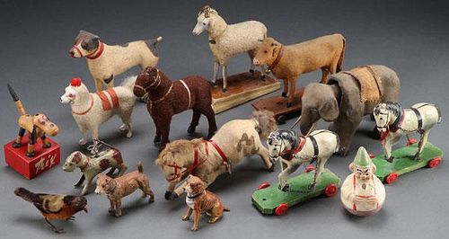 A COLLECTION OF VINTAGE ANIMAL TOYS AND FIGURES