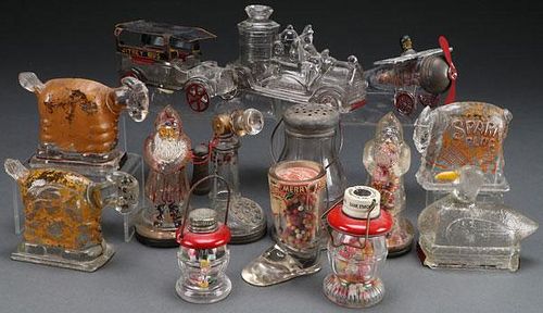A COLLECTION OF 15 VINTAGE GLASS CANDY CONTAINERS