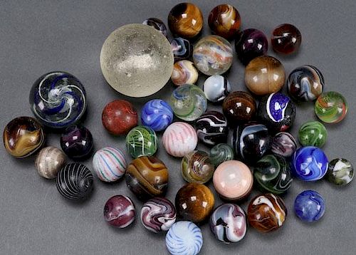 A COLLECTION OF OVER 40 EARLY HAND MADE MARBLE