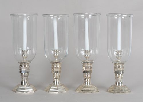 A Set of Four Glass and Silvered-Metal Photophores