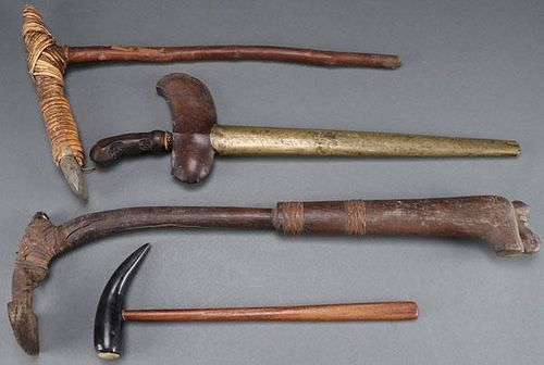 A GROUP OF FOUR INDONESIAN TOOLS