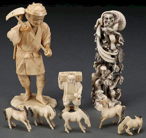 AN EIGHT PIECE GROUP OF JAPANESE CARVED OKIMONOS,
