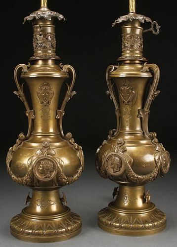 A PAIR OF BRONZE AESTHETIC OIL LAMPS, 19TH C