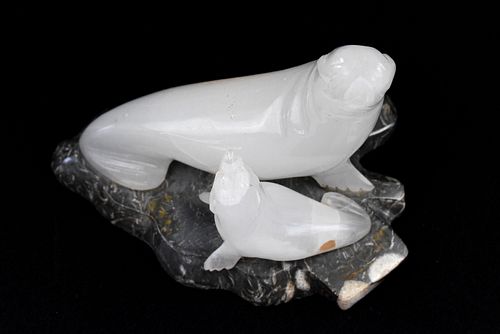 CARVED RUSSIAN ONYX SEALS ON MARBLE BASE