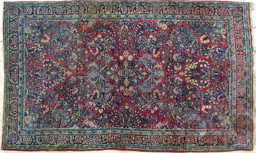 Sarouk throw rug, ca. 1920, 6'9" x 4'3".