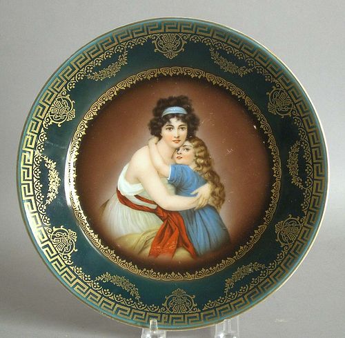 Painted porcelain plate with mother and daughter,a