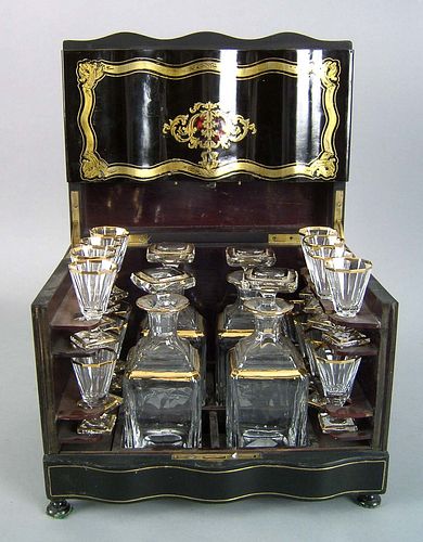 English ebonized cased liquor set, 19th c., the br