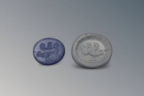 An Eastern Greek Blue Chalcedony Scaraboid from the 3rd Century or Earlier. Engraved with Siren in Profile Facing Right.

Diameter: Approximately 2.4c
