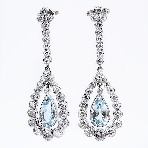 4.50 Carat Round Brilliant Cut Diamond, 6.0 Carat Pear Shape Aquamarine and Platinum Chandelier Earrings.