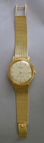 Patek Philippe 18K gold wristwatch with 24K gold r