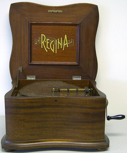 Regina mahogany music box, late 19th c., discs - 1