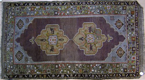 Two oriental throw rugs, ca. 1920, together with a