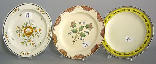 Three creamware plates, 19th c., 9 3/4" dia.