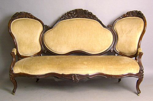 Victorian rosewood sofa, ca. 1870, in a grape patt