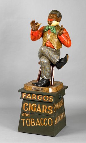 Painted cast zinc cigar store figure of a seated b