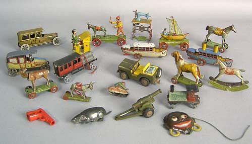 Group of tin penny toys to include 3 horses, dog,o
