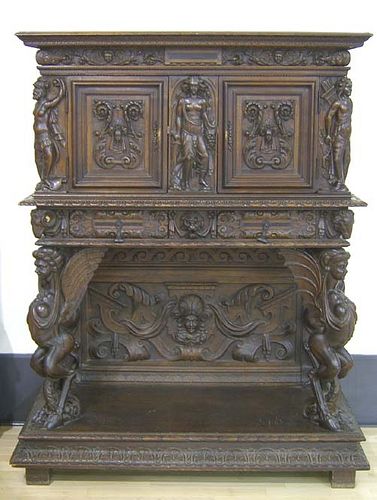 Carved walnut varguano, 20th c., 59" h., 44" w.