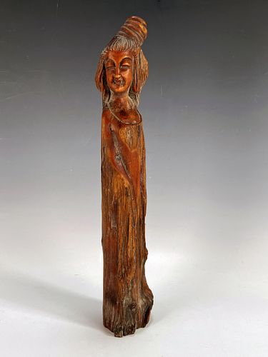 CARVED WOODEN WOMAN