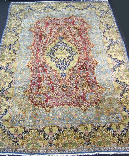 Roomsize Kirman rug, ca. 1930, with central blue a
