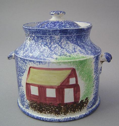 Blue spatter canister form lidded honey pot with a