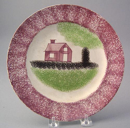 Red spatter plate with red schoolhouse, green tree