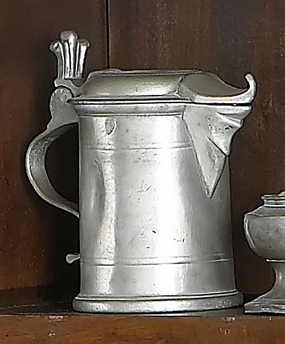 Continental lidded pewter tankard with handle bear